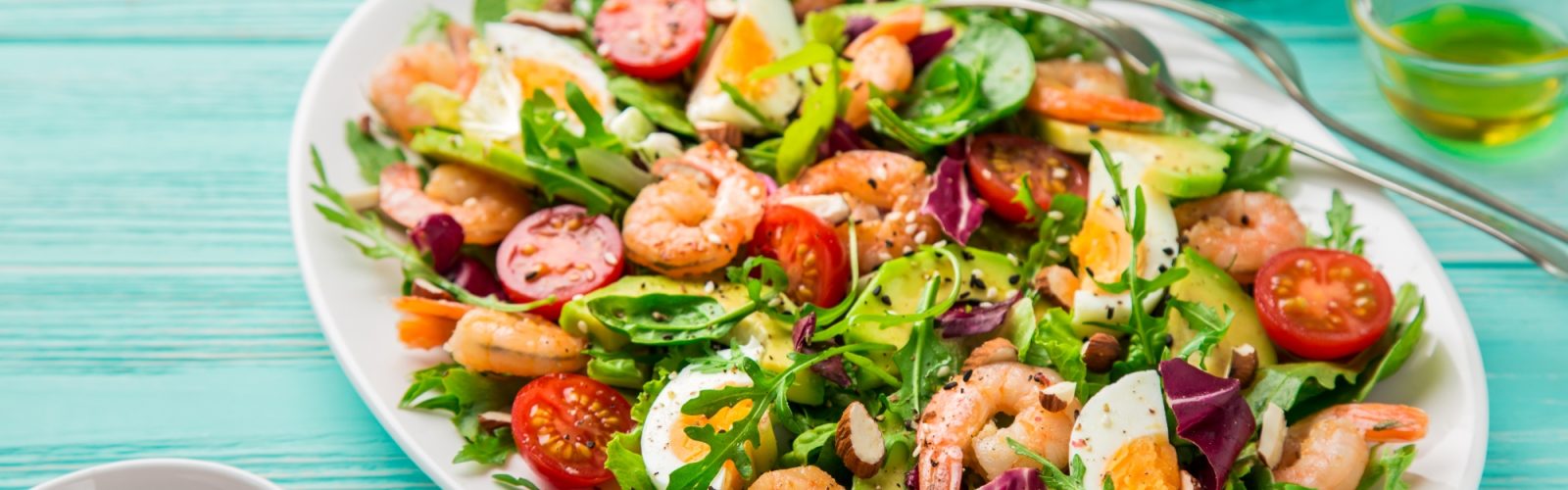 Avocado, tomato, eggs and prawn salad